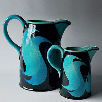 A Pair of green and black jugs