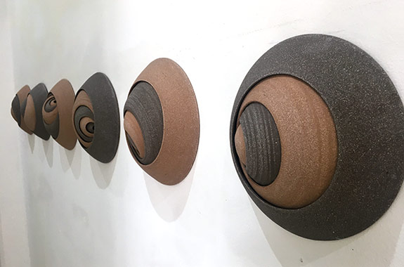 Mat Chambers wall sculptures displayed along corridor