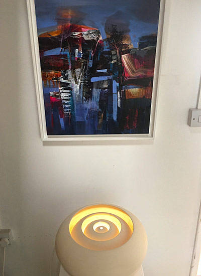 Jane Cox - studio area with ceramics and prints